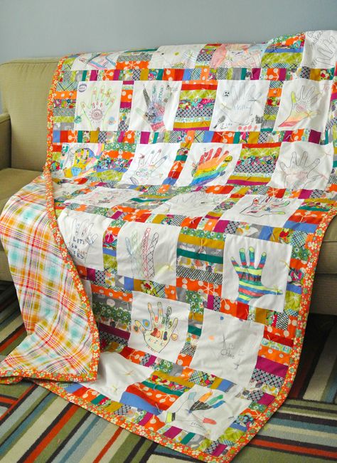 My son's 4th grade class made this quilt for their teacher's end of year gift.  It's made up of 28 squares - they traced their hands and decorated them with textile markers and in between I sewed strip quilted pieces for a fun bright thank you for a wonderful teacher. (teacher gifts, group quilt, kid crafts, class gift) Handprint Quilt, Classroom Quilt, Class Quilt, Sewing Machine Drawing, End Of Year Teacher Gifts, Teacher End Of Year, Sewing Room Storage, Auction Ideas, Tshirt Quilt