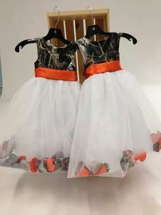 Flower girl dresses, orange and camo! Camoflauge Wedding, Camouflage Wedding Dresses, Camo Dresses, Camo Wedding Dress, Petal Flower Girl Dress, Camo Wedding Dresses, Camouflage Wedding, Vowel Renewal, Dresses Orange