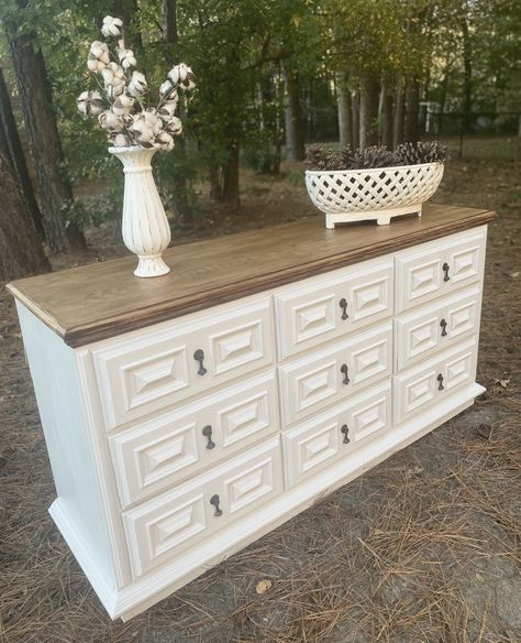 SOLD! Please use for custom order only! This gorgeous 9 Drawer Dresser is an old timer but in amazingly great shape! All dovetailed drawers are sturdy and slide perfectly! Lovely ornate detail highlights every drawer. The original hardware finishes the shabby but beautiful look. Top has been stripped, sanded and stained to its original beauty. Piece has been painted with top of the line paint in a creamy white shade. FREE SHIPPING is for GA, SC, AL only. We do offer a $100 shipping credit for al White Dresser With Painted Drawers, Dressers With A Mirror, White And Wood Dresser Diy Projects, Diy Painting Dresser Ideas, Paint And Stain Dresser, Dresser Remodel Ideas, Repaint Dresser Diy, White Dresser With Wood Top, 9 Drawer Dresser Makeover