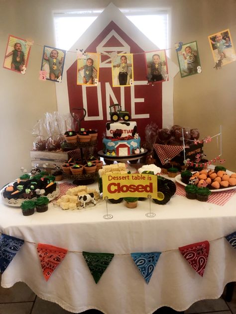 First Birthday Farm Party barn cake table candy cupcakes tracker cows banners Farm Birthday Dessert Table, Dessert Table 1st Birthday, Farm Dessert Table, Cookie Bar Display, Barnyard Birthday Theme, Milk And Cookie Bar, Birthday Dessert Table, Party Cake Table, Dessert Table Birthday