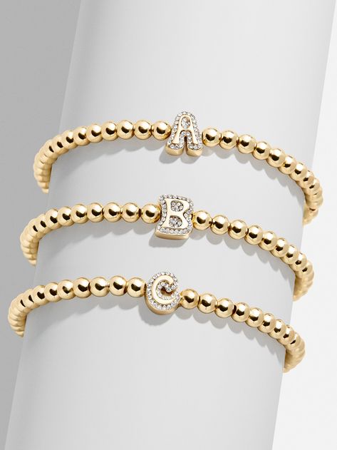 Shop doorbuster deals at BaubleBar, featuring up to 30% off stacking rings, Disney jewelry, custom necklaces & limited time deals. Enjoy free UPS shipping over $75 & free returns. Bauble Bar Bracelet Stack, Bubble Bar Bracelet, Retro Bubble Font, Rings Disney, Baublebar Bracelet, Bubble Font, Gold Medallion Necklace, Disney Necklace, Asymmetrical Necklace