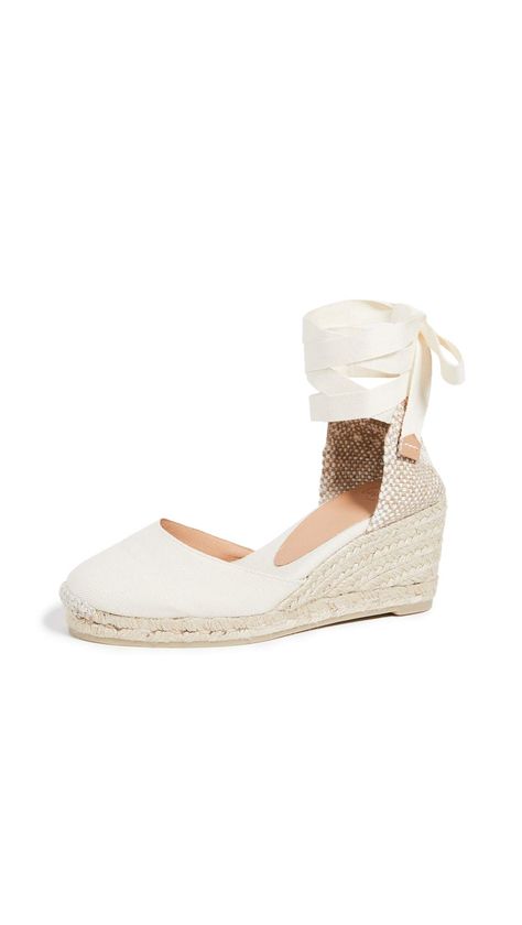 PRICES MAY VARY. Fabric: Canvas Rubber sole Braided jute wedge, Woven heel cap Heel: 3in / 75mm, Platform: 0.75in / 18mm Tie at ankle Everyone's favorite for versatile summertime sandals. These Castaner espadrilles are ready for any dress-up or dress-down occasion with a neutral hue and walkable wedge. Castaner Carina, Spring Wedges, Castaner Espadrilles, Wedge Espadrilles, Women's Espadrilles, Fabric Canvas, Heel Caps, Espadrille Sandals, Beach Shoes