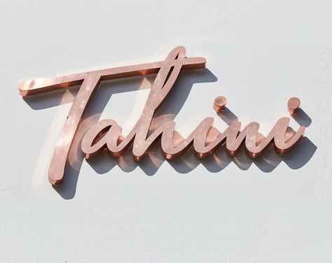 DesignLSM on Instagram: “Cooper signage design for @eat_tahini #brandingbydlsm #restaurantsignage #tahini #harpenden #hospitalitydesign” Copper Signage, Restaurant Signage, 3d Typography, Wayfinding Signage, Environmental Graphics, Signage Design, Hospitality Design, Tahini, Typography