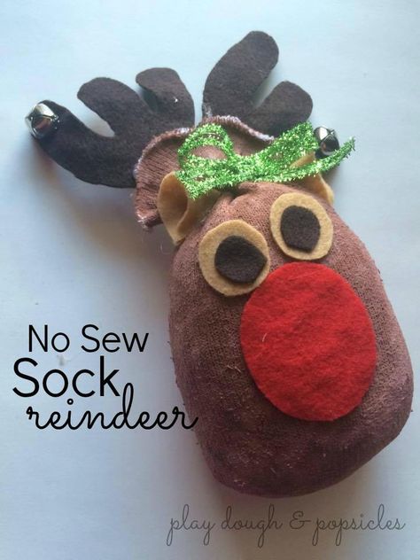 "Using an old sock filled with rice and embellishments a festive friend can be made. Display on a mantel or under the Christmas tree. " Sock Reindeer, Sock Santa, Rice Sock, Craft For Christmas, Christmas Activities For Toddlers, Easy Holidays Crafts, Reindeer Craft, Under The Christmas Tree, Christmas Crafts For Kids To Make