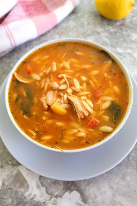 This Mediterranean Turkey Orzo Soup is a comforting warm dish that is pretty economical too since it can be made with leftover shredded turkey or chicken. #soup, #orzo, #turkey, #comfortfood, #budgetfriendlymeal, #mediterraneanfood, #kritharaqe, #mediterraneanlatinloveaffair Turkey Orzo Soup, Soup Orzo, Turkey Orzo, Best Turkey Soup, Soup With Turkey, Orzo Spinach, Ground Turkey Soup, Orzo Soup Recipes, Stews Recipes