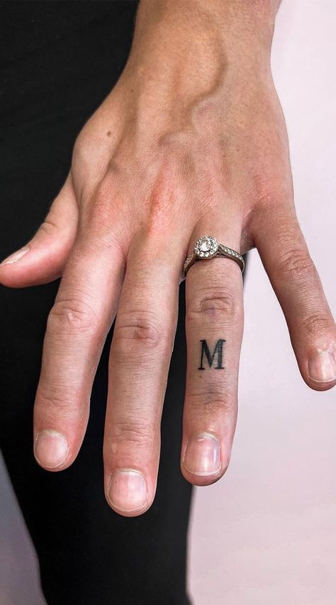 Finger Tattoos Letters Fonts, Initial Finger Tattoo Letters, Simple Tattoos Finger, Initial M Tattoo, Finger Letter Tattoo, Small Tattoo Ideas Simple, Finger Letter Tattoos, Tattoo Ideas Small Meaningful, Letter A Tattoo