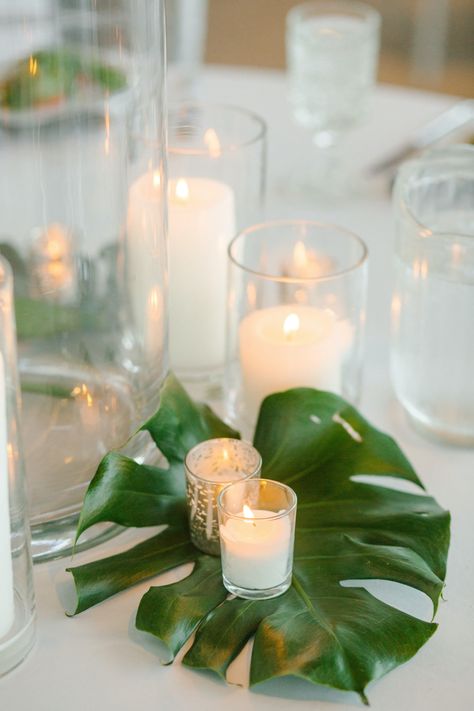 Tropical Party Decorations Elegant, Tropical Diy Centerpieces, Monstera Centerpiece Wedding, Tropical Engagement Party Ideas, Elegant Tropical Party Decor, Tropical Leaf Centerpiece, Tropical Table Setting Wedding, Sage Green Tropical Wedding, Tropical Wedding Centerpieces Diy