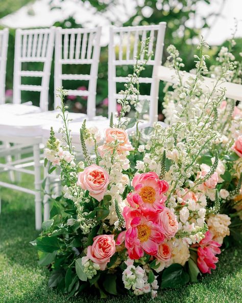 Step into James & Eliza’s dreamy, colorful garden wedding where romance meets vibrant elegance! From lush florals to intimate details, we transformed the backyard of this private residence into a celebration full of love and beauty. Every corner was thoughtfully designed, making it a day to remember. Head to our blog for all the gorgeous details! You can also see this gorgeous celebration featured in Utah Bride & Groom magazine! Link in today’s stories. #michelleleoevents #GardenWedding #... Pink And Peach Flowers, Pink Green Wedding Flowers, English Garden Wedding Flowers, Ceremony Aisle Flowers, Peach Garden Rose, Pink And White Wedding Flowers, Peach Hydrangea, Wedding Multicolor, Pink Yellow Weddings