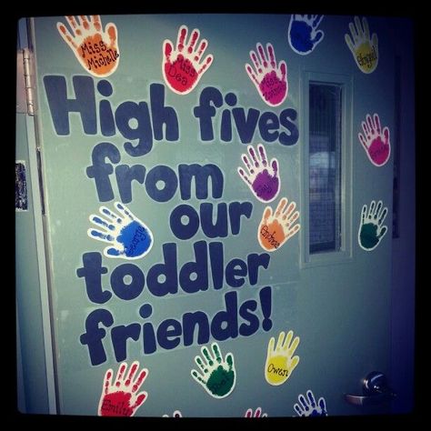 High Five Bulletin Board Ideas, Our Classroom Family Bulletin Board, Simple Preschool Bulletin Boards, Back To School Classroom Decorations Daycare, Classroom Boards Preschool, Daycare Art Display, Handprint Classroom Decor, Art Display Bulletin Boards Preschool, Preschool Teacher Door Ideas