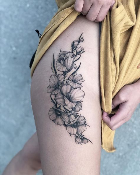 If you've been thinking about getting a tattoo of your zodiac sign, you may want to consider birth flower tattoos while you're at it. Like a birth stone, there Half Sleeve Tattoos Lower Arm, August Birth Flower Tattoo, Gladiolus Flower Tattoos, Gladiolus Tattoo, Water Lily Tattoos, August Birth Flower, Poppies Tattoo, Shape Tattoo, Birth Flower Tattoos