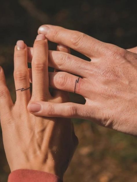 Ditch the Rings: 21+ Badass Wedding Ring Tattoos That Say “Forever" Men’s Tattoo On Ring Finger, Tattooed Wedding Bands, Tattooed Wedding Rings, Ring Finger Tattoo Men, Ring Tattoo For Men, Marriage Tattoos Ring Finger, Celtic Ring Tattoo, Wedding Tattoo Ideas, Marriage Ring Tattoos