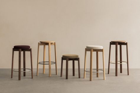 Audo Copenhagen now introduces the Passage Stools in a solid, lacquered walnut edition, redefining contemporary aesthetics with a classic twist.
The collection offers a bar, counter and low stools to set a new standard for refined modern interior design. Counter and bar height versions cater to different seating needs, offering flexibility for use in kitchens, bars and communal spaces. The integration of a black, brushed steel or brushed brass foot ring ensures stability and ergonomic support. Dining And Seating Area, Living Room Workspace, Bottle Grinder, Copenhagen Furniture, Audo Copenhagen, Solid Oak Furniture, Foot Ring, Bathroom Candles, Interior Design Advice