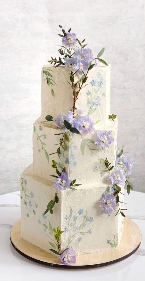 wedding cake, wedding cake ideas, wedding cake trends, 3 tier wedding cake, popular wedding cakes, best wedding cake designs, beautiful wedding cakes, wedding cake ideas 3tier, unique wedding cake designs Sage Green And Lilac Wedding Cake, Marble Wedding Cake, Lilac And Green Wedding Cake, Wedding Cake With Lilac Flowers, Simple Wedding Cake Lilac, Lilac Wedding Cake 2 Tier, Wedding Cakes Lilac, Wedding Cake Hydrangea, Wisteria Wedding