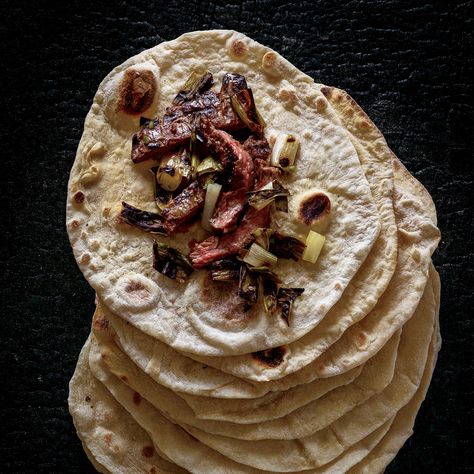 Sourdough Tortillas  with Charred Steak and Scallion Salsa  | Food & Wine Charred Steak, Sourdough Tortillas, Skirt Steak Recipes, Grilled Skirt Steak, Caramelized Shallots, Steak Sauce, Skirt Steak, Steak Dinner, Sourdough Recipes