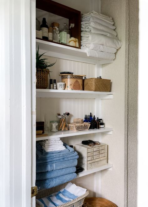 Bathroom Built In Organization, No Bathroom Storage Solutions, Vintage Linen Closet, Small Family Bathroom Storage, Small Bathroom Linen Closet Ideas, Small Powder Room Storage, Vintage Bathroom Organization, Vintage Bathroom Shelves, Books In Bathroom