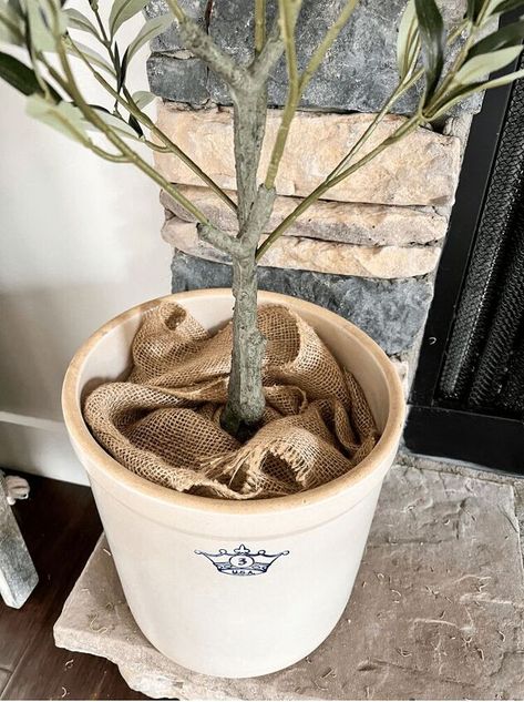 How to Style a Faux Olive Tree | Hometalk Faux Olive Tree Front Porch, Faux Trees Indoor Decor, Olive Tree In Basket, Faux Olive Tree Indoor, Amber Bedroom, Tall Indoor Plants, Faux Rock, Vintage Crock, Indoor Tree