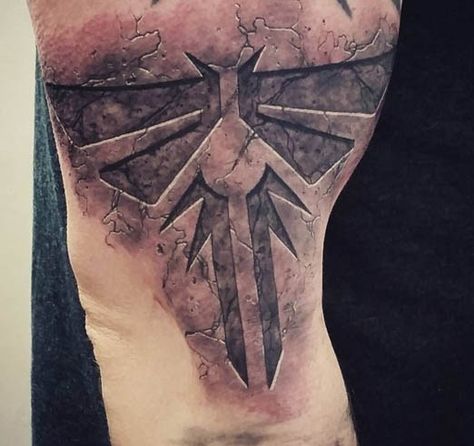 It looks as if this tattoo was chiseled out of stone. Tattoo by Ben Whiteraven. #inked #tattoo #texture #concrete #arm #ink #solid Cracked Stone Tattoo, Shield Knot Tattoo, Crusader Shield Tattoo, Stone Tattoo Realistic, Stone Tattoo Ideas, Doom Slayer Symbol Tattoo, Cracked Tattoo, Rune Stone Tattoo, Warrior Shield Tattoo