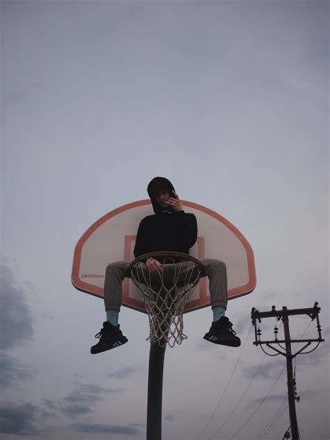 PERSON SITTING ON BASKETBALL NET - Ecosia - Images Sitting On Basketball Hoop, Basketball Net, Basketball Hoops, Man Sitting, Person Sitting, Basketball Hoop, Senior Pics, New Project, The Search