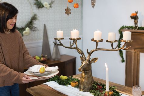 💭Dreaming of your upcoming holiday gatherings? Our Stoic Stag Candle Holder is an enchanting piece that features six holders perfectly suited for 3" pillar candles, providing a captivating display of warmth and light. The perfect centerpiece for your guests to enjoy.💖Free shipping! Tap to shop, or go here: https://shophoneybeehome.com/products/stoic-stag-candle-holder #centerpiece #holidaytable #thanksgivingtable #christmastable #tabletopdecor #candelabra #candleholders #brassdecor #deerdec... Christmas Dining Table Decor, Branch Centerpieces, Large Pillar Candles, Vase Deco, Wrought Iron Candle Holders, Iron Candle Holders, Wrought Iron Candle, Christmas Dining Table, Stag Deer