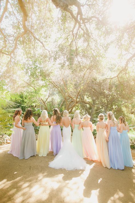 Bridesmaids in pastel rainbow dresses, fairytale wedding, colorful wedding ideas, pastel wedding inspiration, large wedding party Pastel Bridal Party Dresses, Pastel Colored Bridesmaid Dresses, Bridesmaids Pastel Dresses, Pastel Dress Formal Wedding, Pastel Color Wedding Theme Bridesmaid Dresses, Pastel Colored Dresses, Pastel Wedding Bridesmaids, Pastel Outdoor Wedding, Pastel Fairytale Wedding