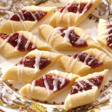 Fanciful Raspberry Ribbons | Midwest Living Raspberry Dessert Recipes, Raspberry Recipes Dessert, Raspberry Thumbprint, Raspberry Dessert, Raspberry Thumbprint Cookies, Raspberry Desserts, Thumbprint Cookies Recipe, Christmas Cookie Exchange, Thumbprint Cookies