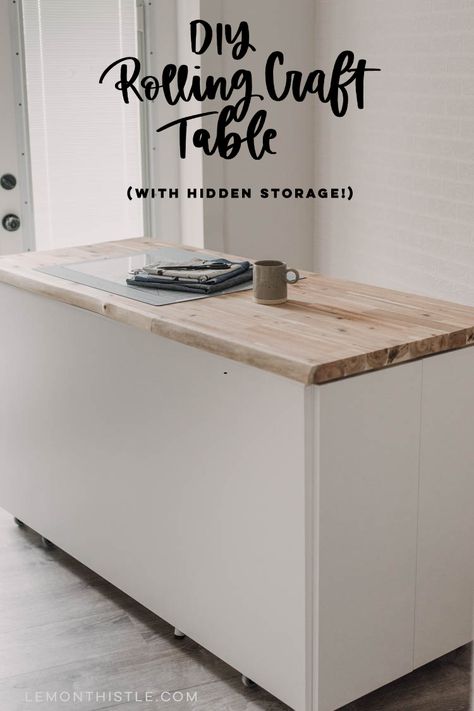 DIY craft table with hidden storage- love the counter height! Rolling Craft Table, Diy Craft Table With Storage, Craft Table With Storage, Prefab Cabinets, Diy Craft Table, Craft Tables With Storage, Rolling Table, Craft Table Diy, Blogger Home