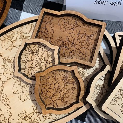 Each tray is laser engraved with a decorative motif on hardwood veneer plywood. Choose from maple, walnut or cherry woods. The trays are finished with a coat of gloss sealer. To clean, wipe with a damp cloth. The small trays are perfect for rings and coins. The medium trays will fit larger jewelry or watches etc. and are a perfect useful trinket tray for your dresser or night stand. The largest tray is lovely for your dresser or small tables to display candles, photos or small decorative objects Wood Burn Serving Tray, Wood Burned Tray, Pyrography Ideas, Wood Trays, Wood Burn Designs, Veneer Plywood, Stationary Art, Laser Files, Diy Tray