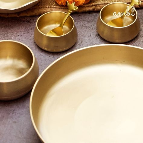 In the heart of Ambi’s kitchen, magic brews. Our Kansa utensils aren’t just vessels; they’re conduits for health and heritage. These handcrafted Kansa utensils are the perfect way to add an Ayurvedic touch to your meals. Honoring the artisans who shaped these utensils. Let’s live our style daily with Ambi. For more details check out www.ambihome.in #Ambi #AmbiHomeDecor #vintage #vintageindia #brassutensils #authenticindia #homedecorindia #homedecor #artisansindia #trendingindia #trending #ba... Indian Kitchen Utensils, Brass Utensils, Outdoor Camping Kitchen, Home Decor India, Camping Kitchen, Floor Candle, Kitchen Magic, Kitchen Redesign, Copper Decor