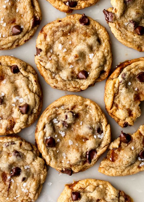 Crunchy, chewy bits of caramel and puddles of chocolate chips lace this vanilla-forward chocolate chip cookie! Aside from the extra step of making the hard caramel (which takes just minutes, no candy thermometer needed!), this is an easy, one-bowl recipe with no rest time for the dough! Salted Caramel Bits, Chocolate Chip Cookies Caramel, Extra Chewy Chocolate Chip Cookies, Chewy Caramel Cookies, Carmel Bits Cookie Recipes, Chocolate Chip And Caramel Cookies, Cookies Using Caramel Bits, Salted Caramel Baking, Cookie Recipes Caramel