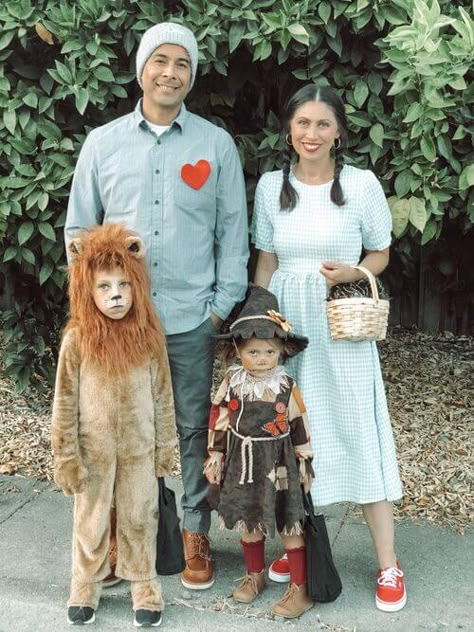 22 Funny Family Halloween Costume Ideas (Perfect For Parents & Kids) Wizard Of Oz Family Costume Diy, Wizard If Oz Costumes Family, Wizard Of Oz Costume Wizard, Family Halloween Costumes Wizard Of Oz, The Wizard Of Oz Family Costumes, Family Scarecrow Costumes, Wizard Of Oz Family Costume Ideas, Lion Family Costume, Wizard Of Oz Costume Ideas Family