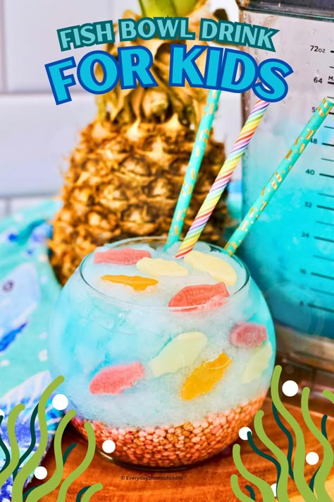 Dive into the enchanting world under the sea with this non-alcoholic, kid-friendly fish bowl drink, where mermaid dreams come true with every sip. Fun Kids Drinks For Parties, Fishbowl Drink Non Alcoholic, Under The Sea Punch, Diy Fishbowl Drink, Fish Bowl Drink Nonalcoholic, Fish Bowl Drink Ideas, Fish Bowl Drink For Kids, Diy Fish Bowl Drink, Under The Sea Drinks