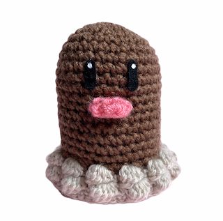 Free Diglett Pokemon Crochet Amigurumi Pattern Rowlet Crochet Pattern Free, Diglett Pokemon, Pokemon Crochet, Pokemon Crochet Pattern, Crochet Bodies, Light Worsted Weight Yarn, Crochet Pokemon, Bobble Stitch, Pink Yarn