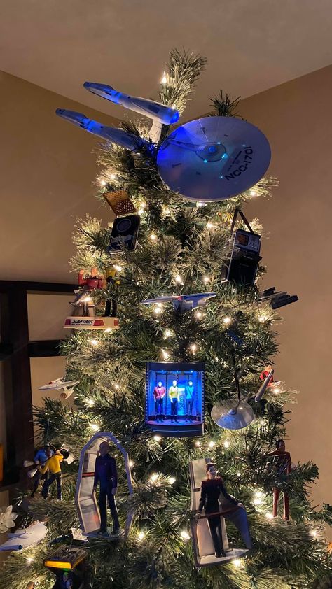 Star Trek tree decorated with Hallmark ornaments with a starship topper. Star Trek Christmas, Nerdy Christmas, Geek Christmas, Star Trek Funny, Star Trek Ships, Creative Halloween Costumes, Hallmark Ornaments, Christmas Tree Themes, Christmas Tree Toppers