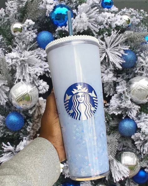 "* Please Read* Starbucks \"Blue Snowflake\" Tumbler This tumbler is inspired by the the Christmas Holiday and all its beautiful Splendor.  This tumbler is filled with beautiful snowflakes and sparkling glitter.  It is normal for the glitter and confetti to settle if stationary for some time.  Give your cup a shake to mix everything up. Tumblers can be personalized along with the color of the Siren logo. Please choose from the selection provided.  Please indicate where you would like your name placed if personalizing your tumbler.  Any fonts placed in front near the logo will be smaller(about 2.5inches)  and will be curved to the logo (unless specified) fonts located on the back may be bigger (5.5in to 6in).  If No straw add on is selected you will receive a green Starbucks straw.  This it Snowflake Tumbler, Starbucks Christmas Cups, Starbucks Cup Design, Starbucks Cup Art, Christmas Bling, Christmas Cups, Custom Starbucks Cup, Starbucks Christmas, Christmas Glitter