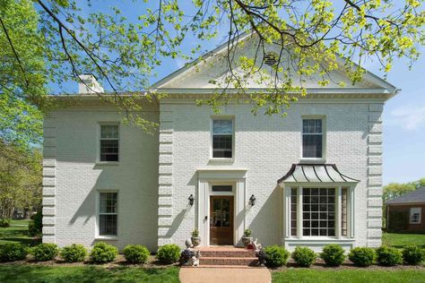 When done correctly, painted brick can last years before needed to be touched up. #details #easyhomedecorideas #homedecorinspiration #homeimprovementideas #marthastewart Brick House Patio Ideas, Brick House Patio, Keystone Gray Sherwin Williams, House Patio Ideas, Brick Options, White Brick House, Gray Sherwin Williams, Painting Brick, Exterior Paint Color Combinations