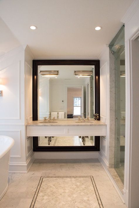 Incredible bathroom with full wall black framed mirror framing a floating double vanity with marble counter below a pair of polished nickel inset vanity lights. Full Wall Mirror, Mirror Interior Design, Wall Mirror Diy, Lighted Wall Mirror, Master Bathrooms, Rustic Wall Mirrors, Black Wall Mirror, Antique Mirror Wall, Mirror Wall Living Room