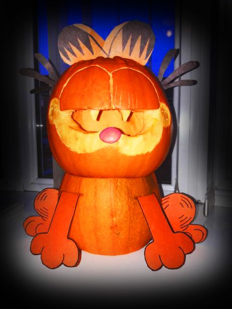 A pumpkin which I made for Halloween, and which I'm very proud of. May not be another drawing, but it's art, so it counts. Garfield Pumpkin Carving, Garfield Pumpkin Painting, Garfield Pumpkin, 90s Fashion Outfits Hip Hop Party, Pumpkin Carving Templates, Pumpkin Painting, Painted Pumpkins, Pumpkin Decorating, A Pumpkin