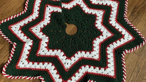 Betty McKnit presents the 6-Day Star Holiday Tree Skirt featuring her signature stitch lineup originally from her 6-Day Kid Blanket from many years ago. You can find Betty McKnit on… The post Crochet 6-Day Star Holiday Tree Skirt Pattern appeared first on The Crochet Crowd. Christmas Tree Skirt Crochet, Tree Skirt Crochet Pattern, Christmas Tree Skirt Crochet Pattern, Tree Skirt Crochet, Crochet Tree Skirt, Skirt Crochet Pattern, Holiday Tree Skirts, Tree Skirt Pattern, Crochet Bobble