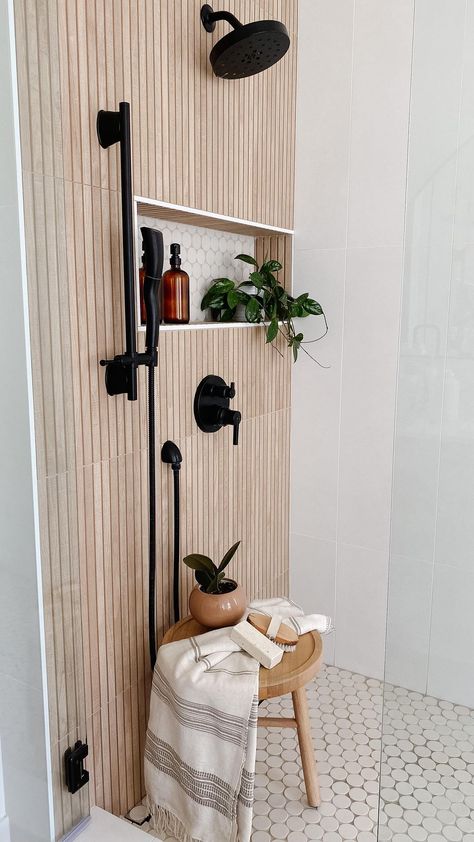 The shower design that dreams are made of ✨ With the combo of different tiles it bring an organic feel to the space. Think of your rooms… | Instagram Modern Organic Shower Design, Wood Look Tile Shower Niche, Scandinavian Shower Tile, Modern Farmhouse Shower Tile Wall, Shower Wood Wall, Organic Modern Spa Bathroom, Faux Wood Tile Shower Walls, Wood Panel Tile Bathroom, Vertical Wood Tile Shower Ideas