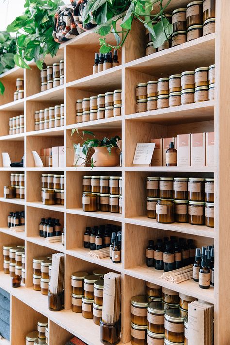 Light At The End - PF Candle Co. | Goodhood Candle Merchandising Display, Candle Store Display Ideas, Candle Store Interior, Market Booth Design, Candle Display Ideas, Candle Store Display, Pf Candle, Apothecary Store, Lilin Aroma