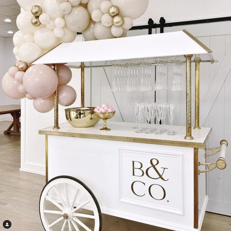 Champagne Cart Ideas, Bar Cart For Events, Champagne Cart Wedding, Champagne Bar Cart Wedding, Party Food Carts, Sweet Cart On Wheels, White Candy Cart With Balloons, Diy Cart, Party Cart