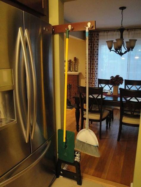 Sliding Home Organizers for Mops and Brooms, Space Saving Storage Solutions #trackhomeremodel Broom And Mop Storage Ideas, Apartment Storage Solutions, Mop Storage, Broom Storage, Broom Closet, Apartment Storage, Broom Holder, Saranac Lake, Mops And Brooms