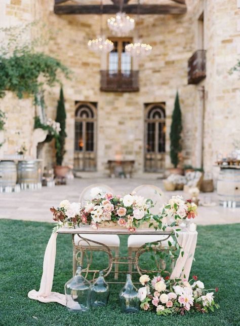 Charming California winery wedding with stunning florals | California Real Weddings | Gallery | Item 50 Sunstone Villa, California Winery Wedding, Wedding Locations California, Magical Castle, Vintage Furniture Design, Heart Table, Rustic Wedding Decorations, Sweetheart Table Wedding, Summer Florals