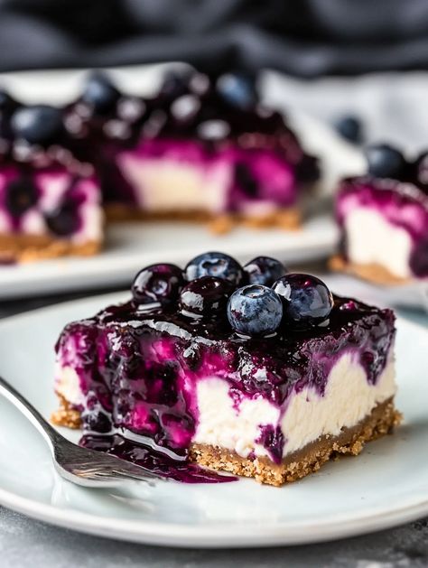 Blueberry Bliss Cheesecake Bars 🫐 

🫐 𝗜𝗻𝗴𝗿𝗲𝗱𝗶𝗲𝗻𝘁𝘀 🫐
Oatmeal Cookie Crust:
4 oz unsalted butter, room temp
½ cup light brown sugar
¼ cup granulated sugar
1 egg
1 tbsp bourbon
1 tsp vanilla extract
¾ cup all-purpose flour
¼ tsp cinnamon
½ tsp baking soda
½ tsp salt
1 ¼ cups old-fashioned oats
16 oz cream cheese, softened
½ cup granulated sugar
¼ cup light brown sugar
2 eggs
1 tsp vanilla bean paste (or extract)
1 tbsp bourbon
1 cup fresh blueberries 🫐🫐 Blueberry Cheesecake Tart, Blueberry Cheesecake Bites, Oatmeal Cookie Crust, Blueberry Lemon Cheesecake, Cinnamon Roll Desserts, Chocolate Orange Cheesecake, Chocolate Covered Strawberry Cake, Triple Chocolate Mousse Cake, Blueberry Cheesecake Bars