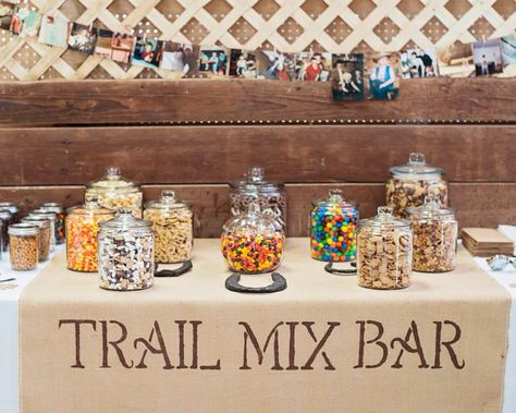 Wedding trail mix bar Trail Mix Bar Wedding, Wedding Trail Mix Bar, Wedding Snack Bar, Graduation Diy Decorations, Trail Mix Bar, Wedding Snacks, Trail Mix Recipes, Lumberjack Baby Shower, Bar Mix