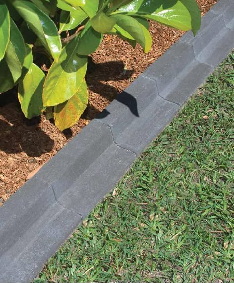 Our lawn edge pavers create a crisp, polished transition between your garden bed and lawn. Call Australian Paving Centre for more information. Garden Lawn Edging, Garden Pavers, Side Yard Landscaping, Backyard Plants, Front Landscaping, Landscape Edging, Lawn Edging, Lawn And Landscape, Garden Lawn