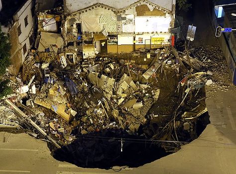 Sinkholes around the world - in pictures Water Spout, Sink Or Swim, End Of Days, Guangzhou China, Construction Site, Extreme Weather, End Of The World, Natural Disasters, Guangzhou