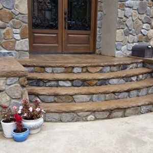 Rock Front Porch Steps, Front Steps Ideas Concrete Entrance, Half Circle Front Steps, Half Moon Steps, Cement Porch Ideas Front Steps, Front Porch Steps Ideas Entrance Stone, Curved Porch Steps, Entrance Steps Design Outdoor, Front Door Concrete Steps Ideas