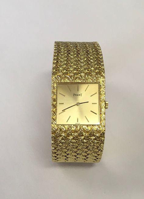 "Genuine Piaget watch with a manual movement in 18 karat yellow gold with a woven 18 karat yellow gold bracelet.  The watch measures 7\" long and 7/8\" wide.  It has a square case and gold stick dial.  Watch is in excellent condition and was serviced 1/9/2021.  Preowned.  Serial # 362124.  Model # 9352D2." Piaget Watch, Fancy Watches, Luxury Bags Collection, Titanium Watches, Crosses Decor, Cartoon Wallpaper Iphone, Cartier Watch, Yellow Gold Bracelet, Lovely Ring