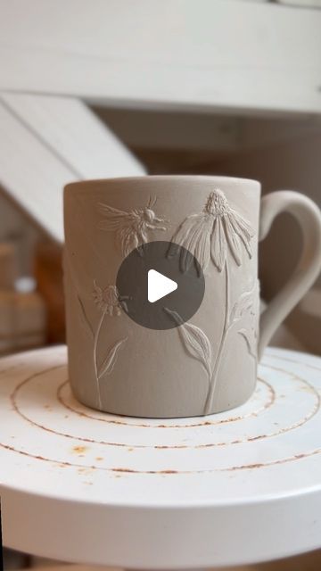 Little Garden Pottery 🌿🐝 on Instagram: "Coneflower & bee mugs coming soon! 🌸🐝🌿   #potterystudio #ceramicstudio #botanicalmug #handmadepottery #ceramicart #basrelief #potteryvideo" Pottery Bee, Bee Mugs, Bee Pottery, Bee Bath, Pottery Projects, Pottery Videos, Garden Pottery, Ceramic Studio, Little Garden